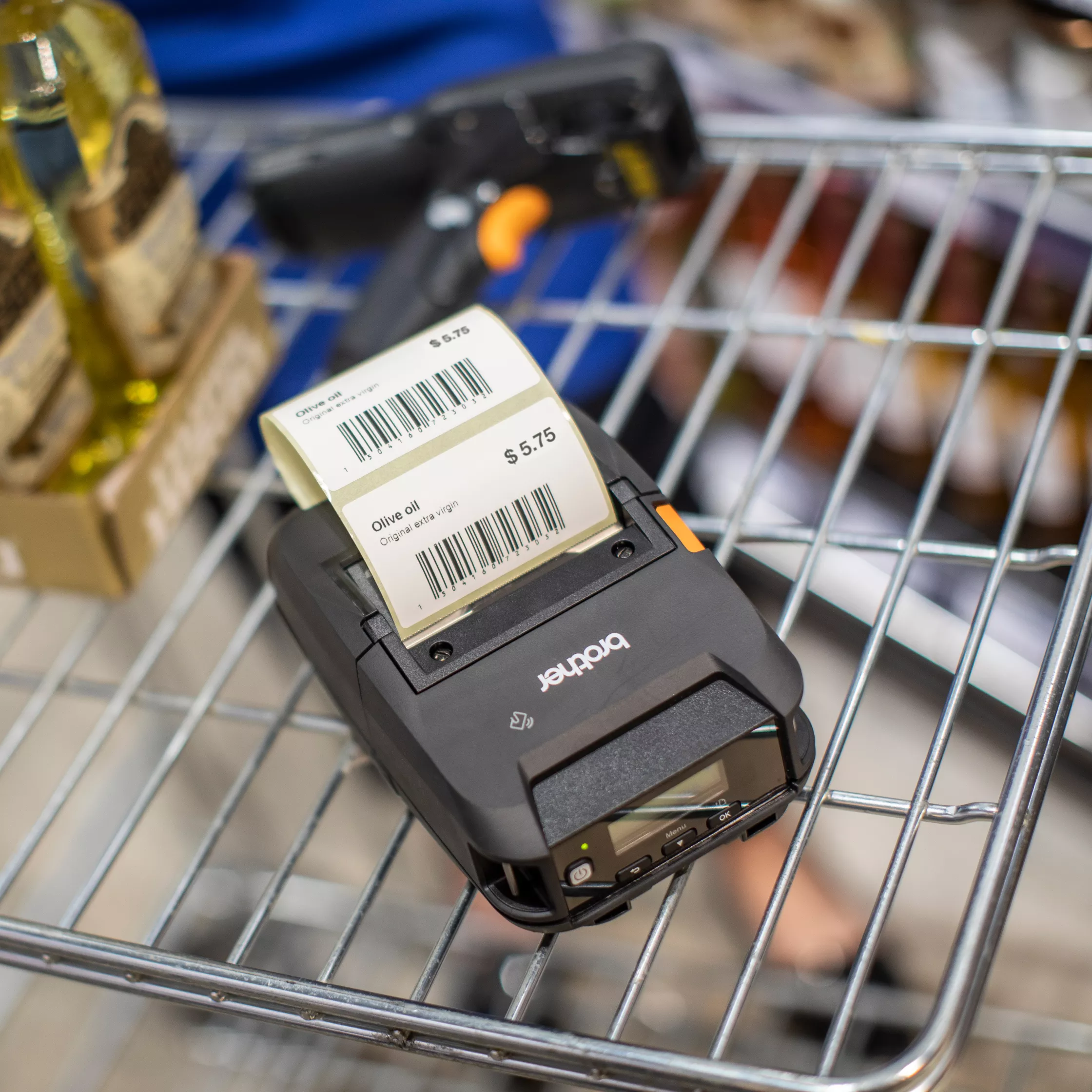 portable printer brother rj-3230b facing right  sitting on a trolley with print out